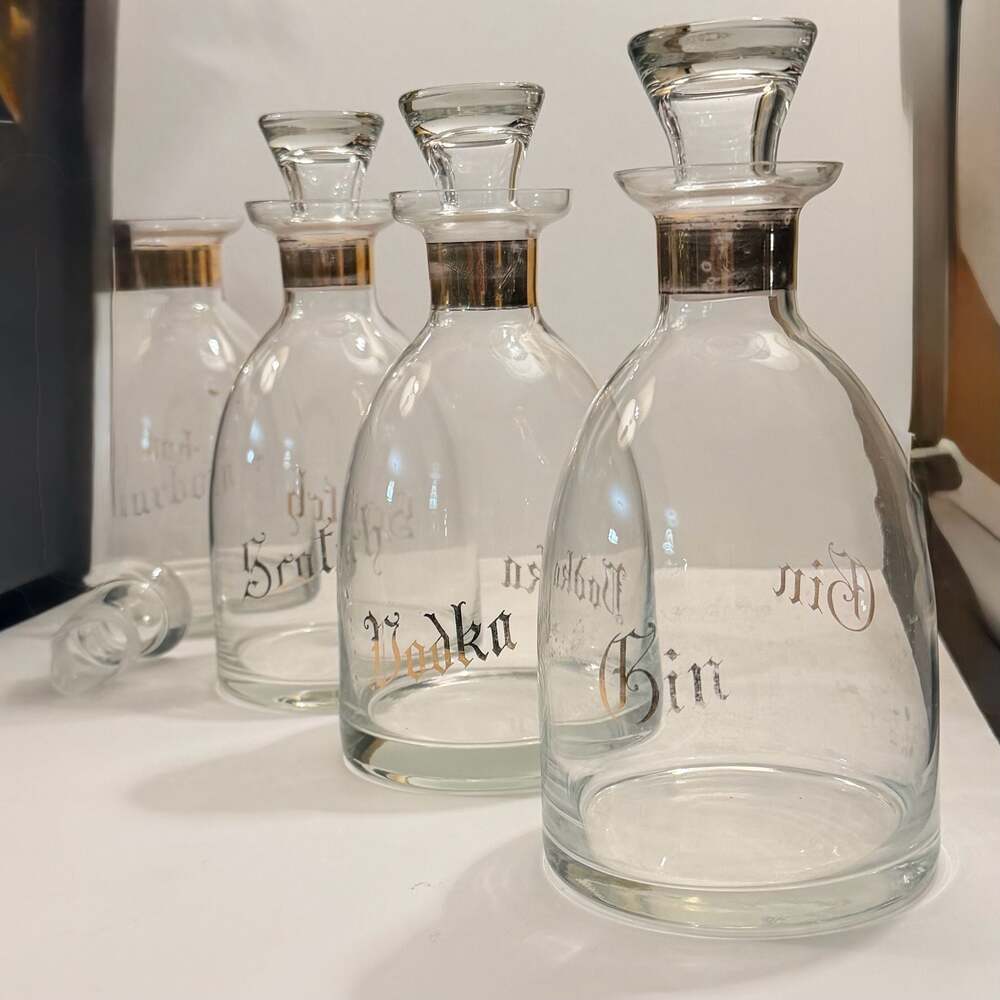 Rare vintage etched glass decanters  'Gin', 'Vodka', 'Bourbon', and 'Scotch'